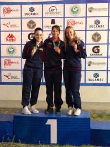 L to R, Mary Tucker, second place, Sagen Maddalena, first place, and Ali Weisz, third place, with their medals for Women’s Air Rifle at the CAT Championship in Lima, Peru, Nov. 8. 